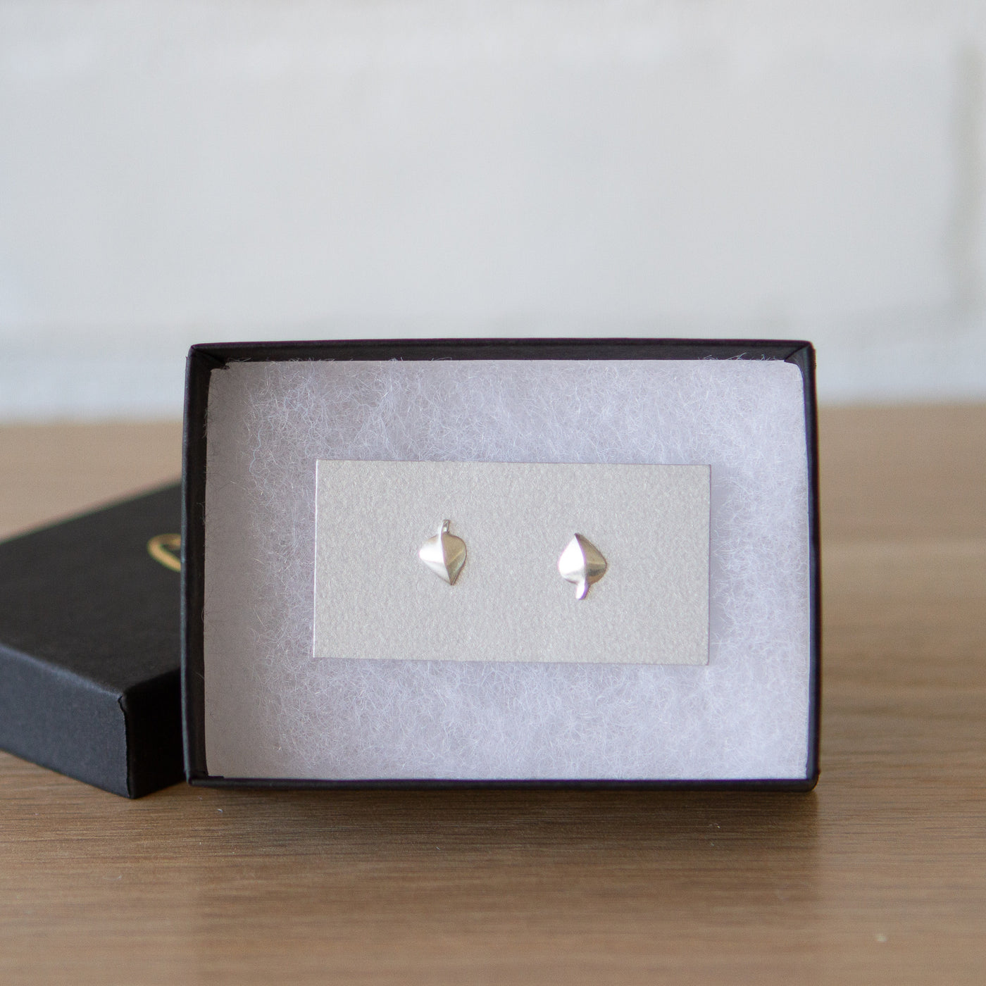 Silver Aspen Leaf Studs by Corey Egan in a gift box
