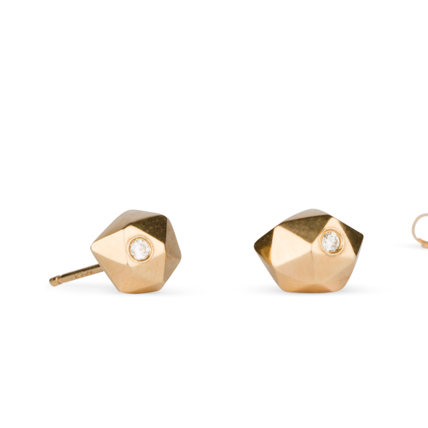 Geometric faceted gold wabi-sabi stud earrings with white diamonds in 14k yellow gold side view on a white background by Corey Egan