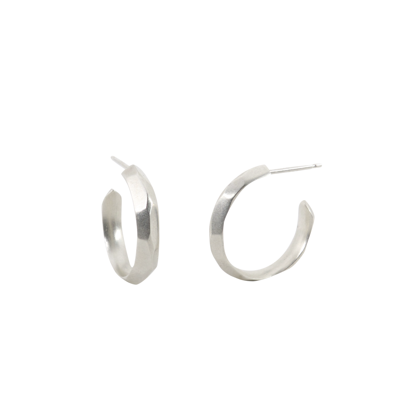Sterling silver small faceted hoop earrings with posts by Corey Egan on a white background