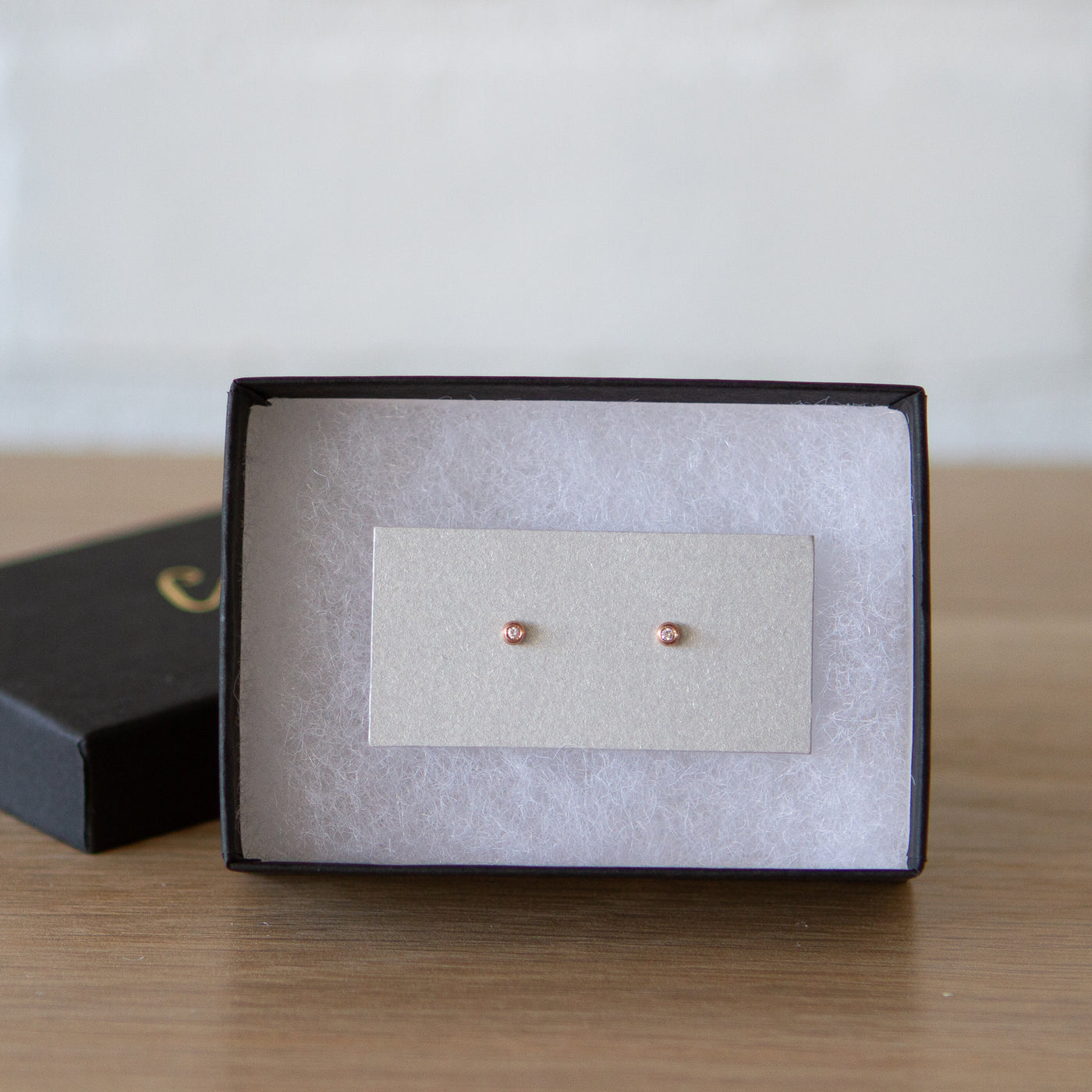 Rose Gold Diamond Droplet Studs in a gift box