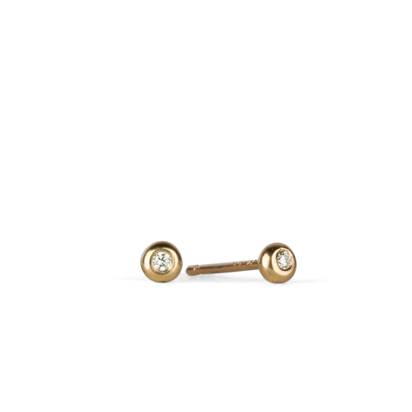Yellow Gold Diamond Droplet Studs by Corey Egan side view on a white background