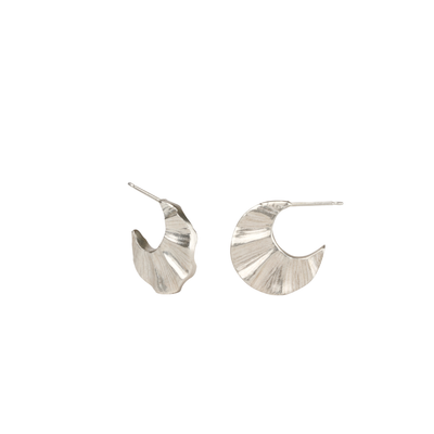 Sterling silver wave texture undulating small hoops by Corey Egan