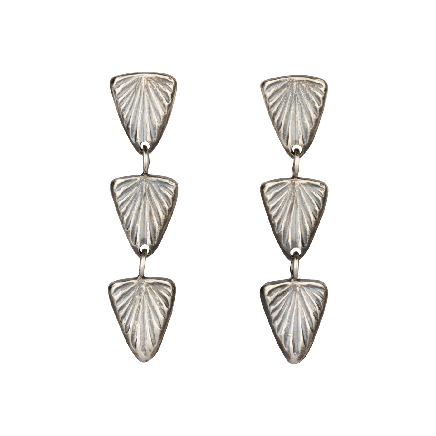 Oxidized silver triple drop earrings of cared triangular sparks with post backs on white