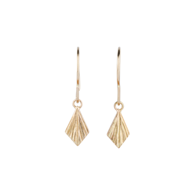 Gold Flame Earrings by Corey Egan on a white background