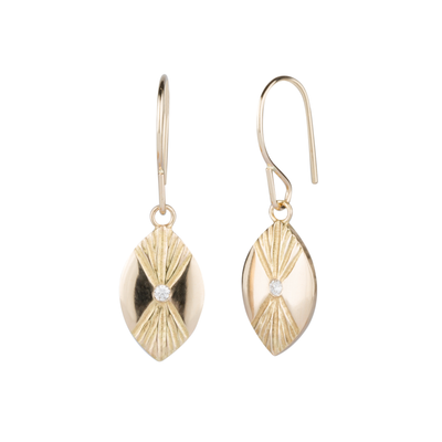 Lumens Eye Gold and Diamond Dangle Earrings by Corey Egan side view on a white background