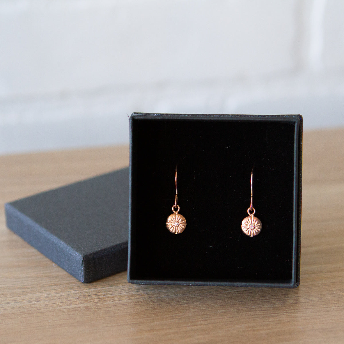 Rose Gold Sunburst Lucia Earrings with Diamonds in a gift box