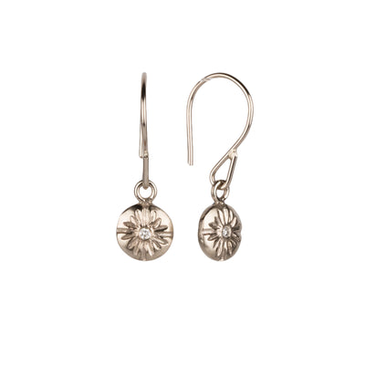 side view Round Small Lucia dangle earrings in white gold with diamond centers on a white background