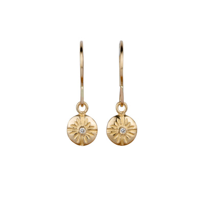 Gold and Diamond Small carved sunburst Lucia Dangle Earrings on a white background