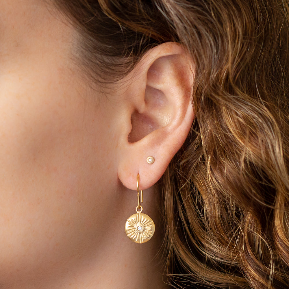Lucia Large Dangle Earrings in Vermeil on an ear | Corey Egan