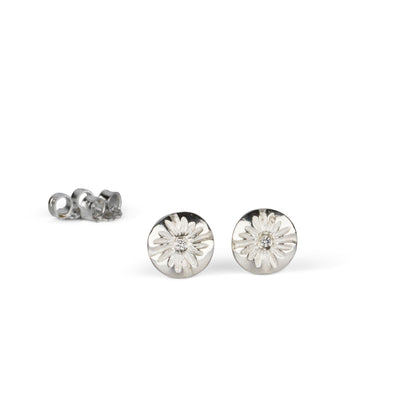 Small Lucia Diamond Stud Earrings on a white background by Corey Egan