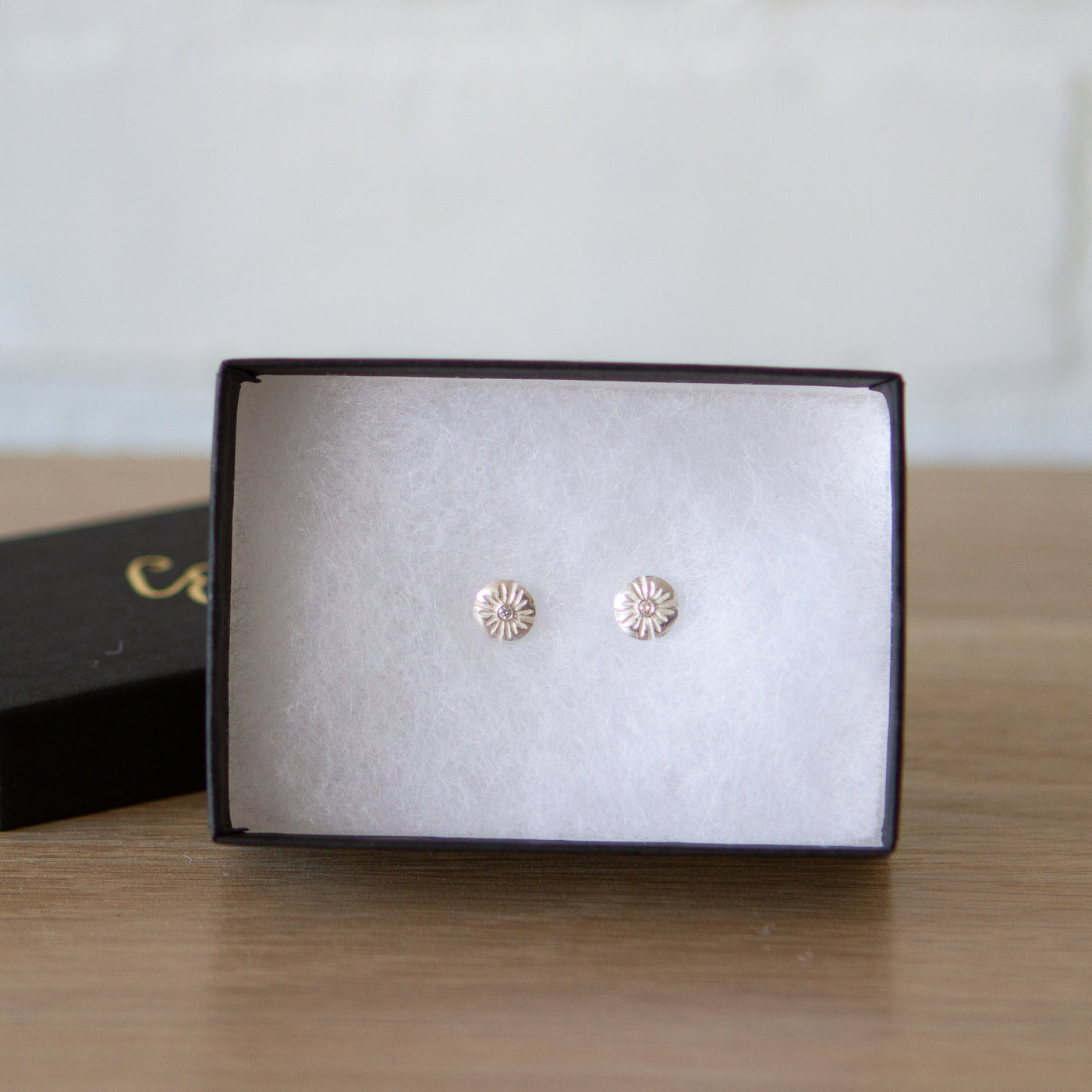 Small Lucia Diamond Stud Earrings in a gift box by Corey Egan