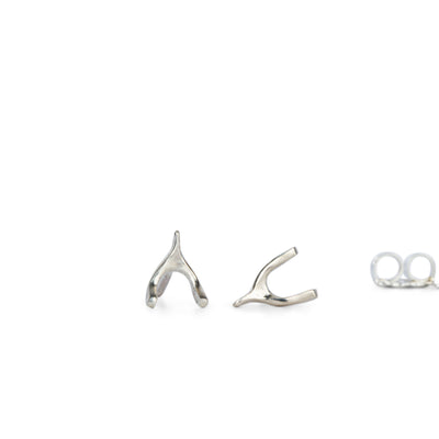 Silver Wishbone Stud Earrings by Corey Egan on a white background