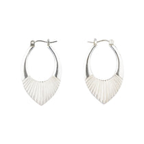 Medium Silver Oblong hoops with hinge closure and sunburst bottom by Corey Egan on a white background