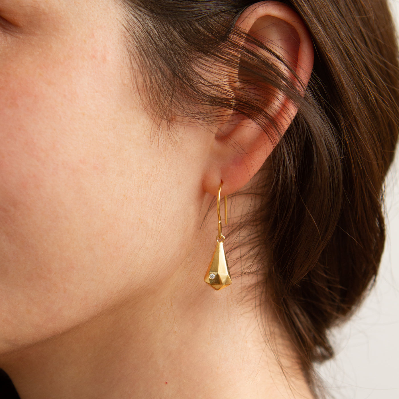 Vermeil and Diamond Crystal Fragment Earrings modeled on an ear