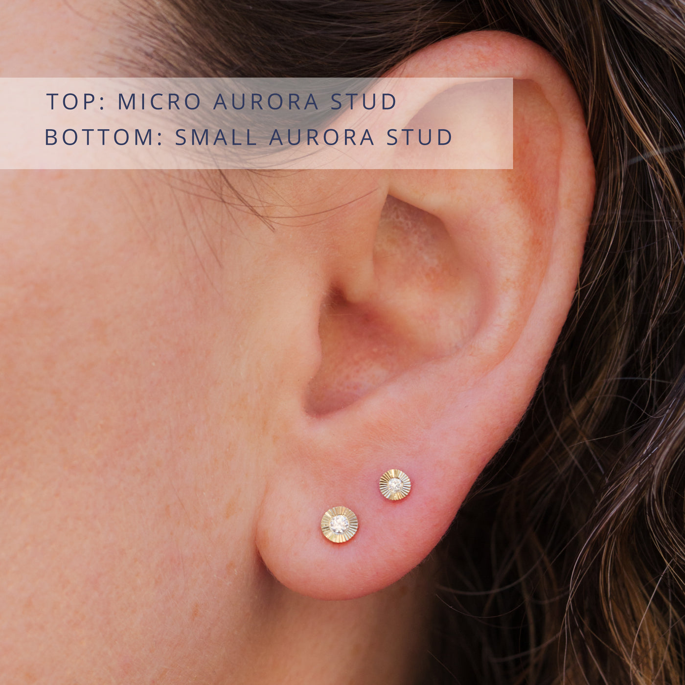 Aurora stud earrings on a model's ear. Top: 14k yellow gold micro Aurora diamond studs, bottom: 14k yellow gold Small Aurora diamond studs