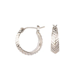 Hoop earrings with hinge closure and herringbone carved texture in sterling silver
