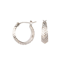 Hoop earrings with hinge closure and herringbone carved texture in sterling silver