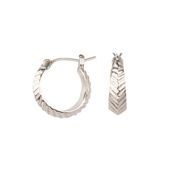 Hoop earrings with hinge closure and herringbone carved texture in sterling silver