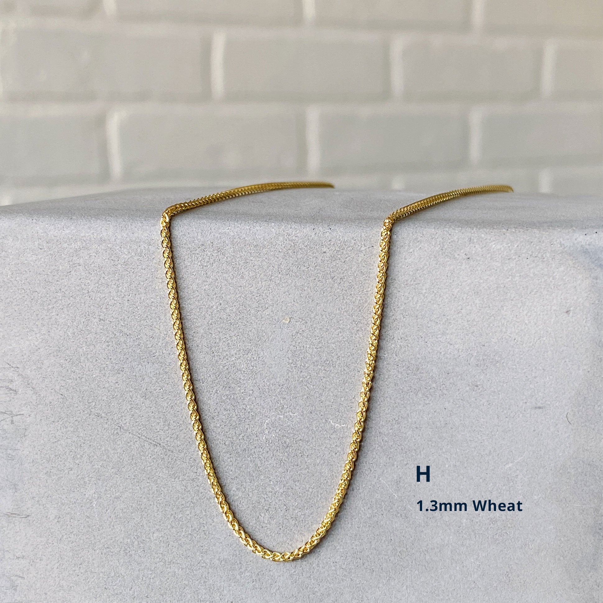 14k yellow gold 1.3mm whtea chain