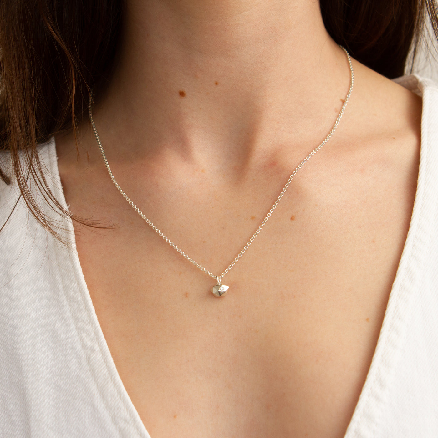 Silver Tiny Fragment Diamond Necklace modeled on a neck