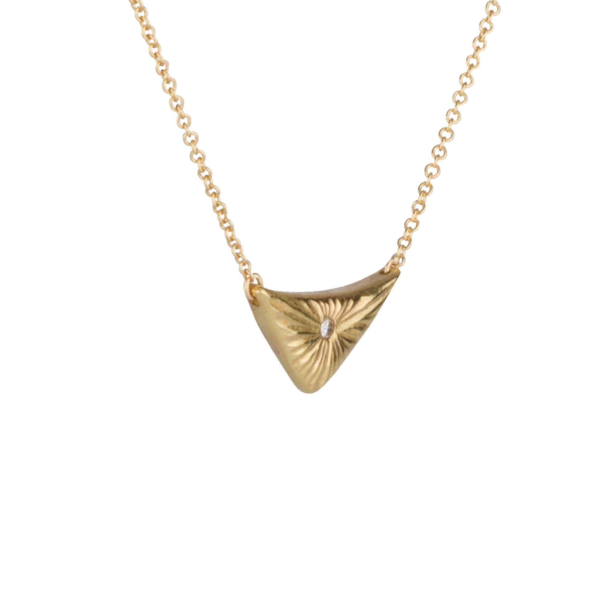 Triangular gold flash necklace with a diamond center and sunburst carved motif in 14k yellow gold. by Corey Egan
