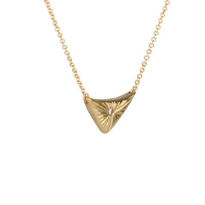 Triangular gold flash necklace with a diamond center and sunburst carved motif in 14k yellow gold. by Corey Egan