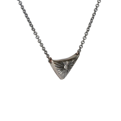 Triangle oxidized silver flash necklace with carved rays motif and a single center diamond