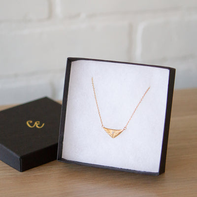 Flash triangular carved sunburst Vermeil Necklace with a diamond center in a gift box
