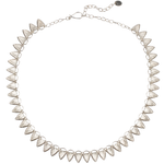 Sterling silver statement necklace made of triangular carved links with a sunburst design on a white background | Corey Egan