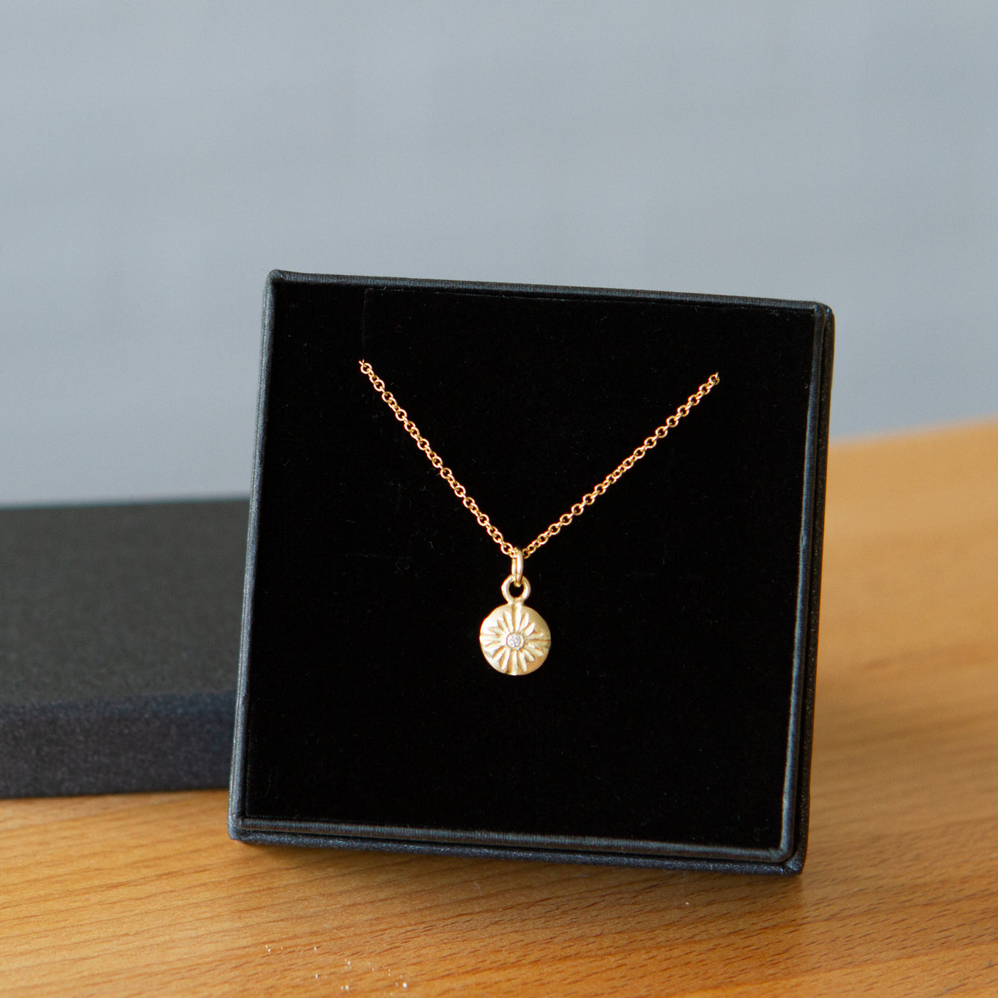Gold and Diamond Small Sunburst Lucia Necklace in a gift box