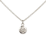 Small Lucia Diamond Necklace on a white background by Corey Egan