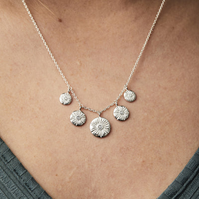 Five Lucia Diamond Silver Necklace around a neck  | Corey Egan