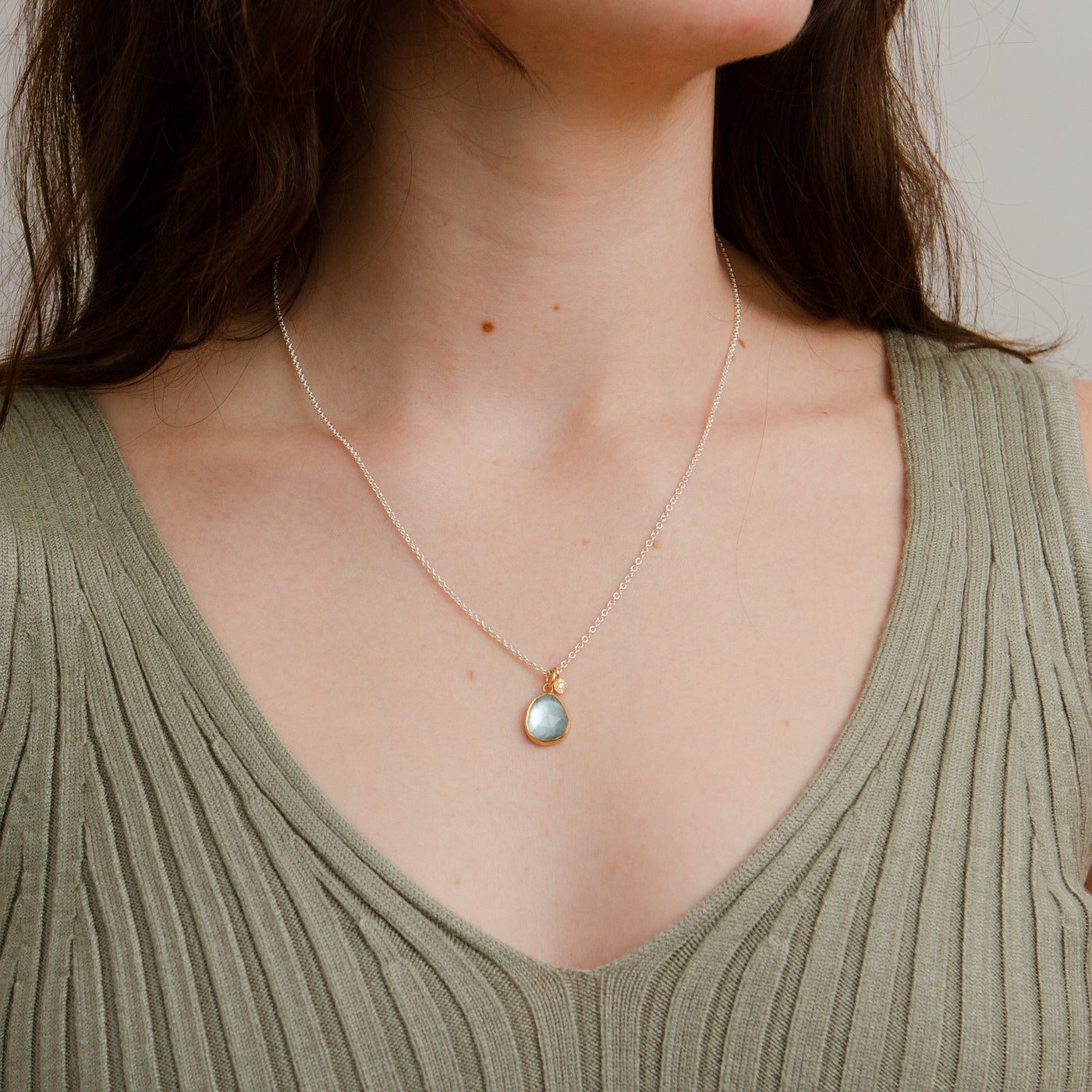 Aquamarine Silver and Gold Theia Necklace #3 on a model