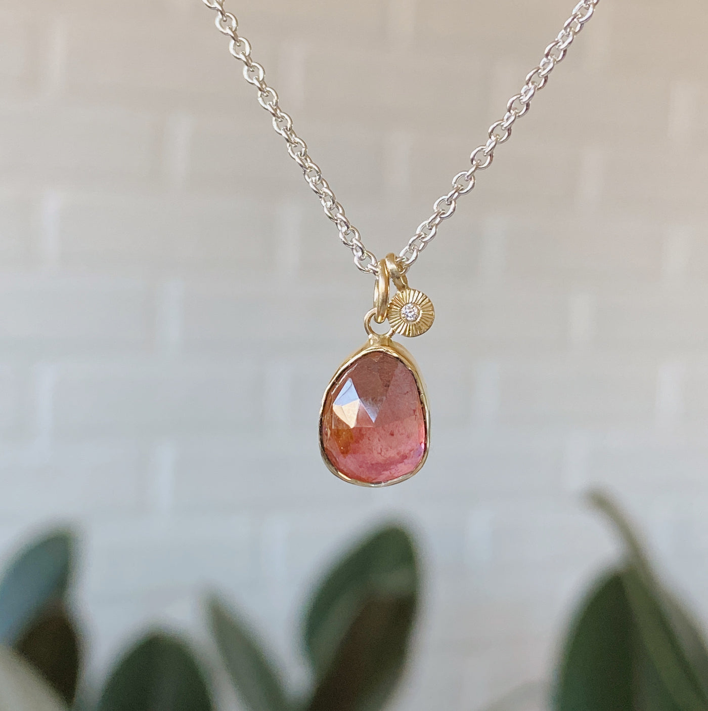Freeform rose cut pink tourmaline 14k yellow gold Theia necklace with an engraved white diamond side pendant on a silver chain