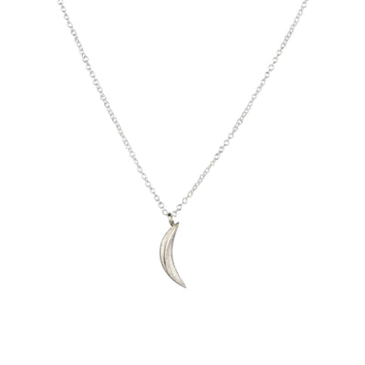Silver Small Wisp Moon Necklace by Corey Egan on a white background