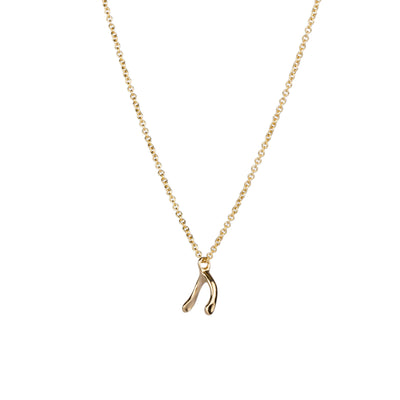 Side view of gold wishbone necklace on a white background side view