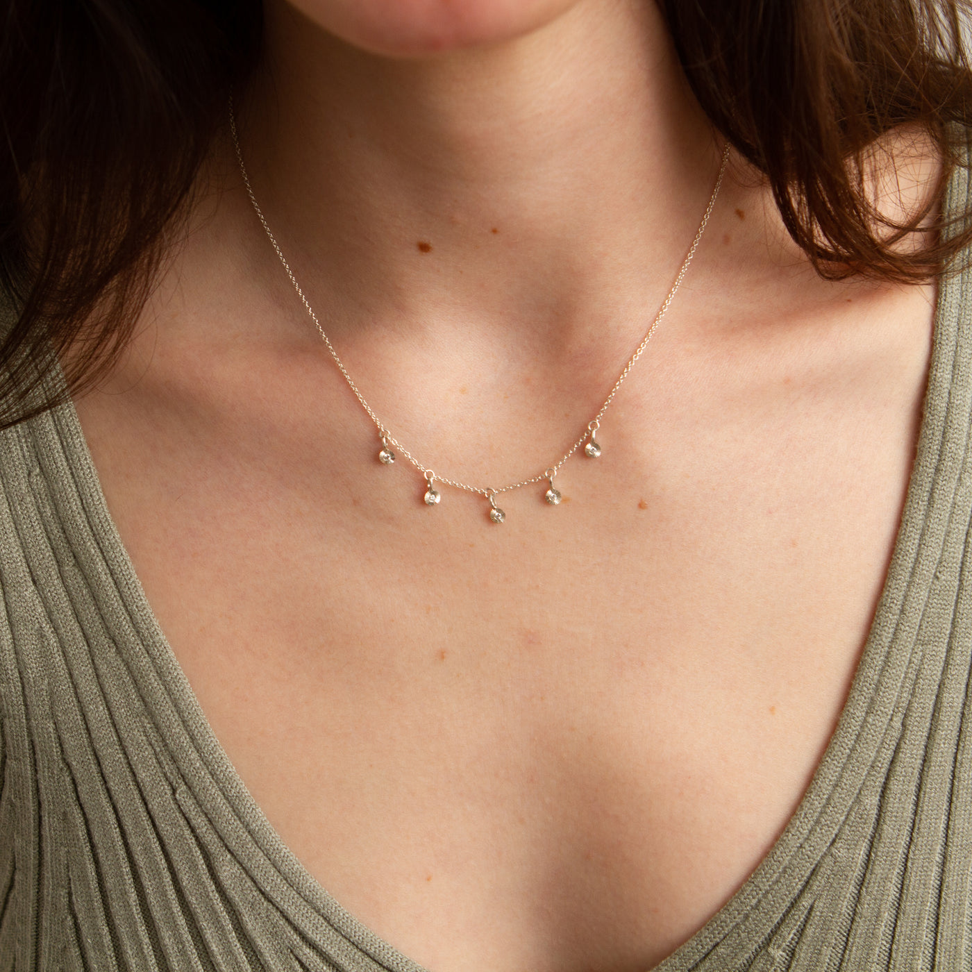 Silver Borealis Necklace modeled on a neck