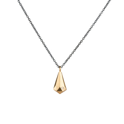 14k yellow gold faceted fragment pendant with a single diamond on an oxidized silver chain. by Corey Egan