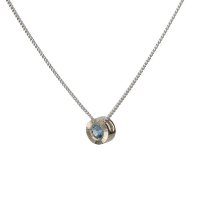 14k white gold small aurora necklace with a blue montana sapphire center side view