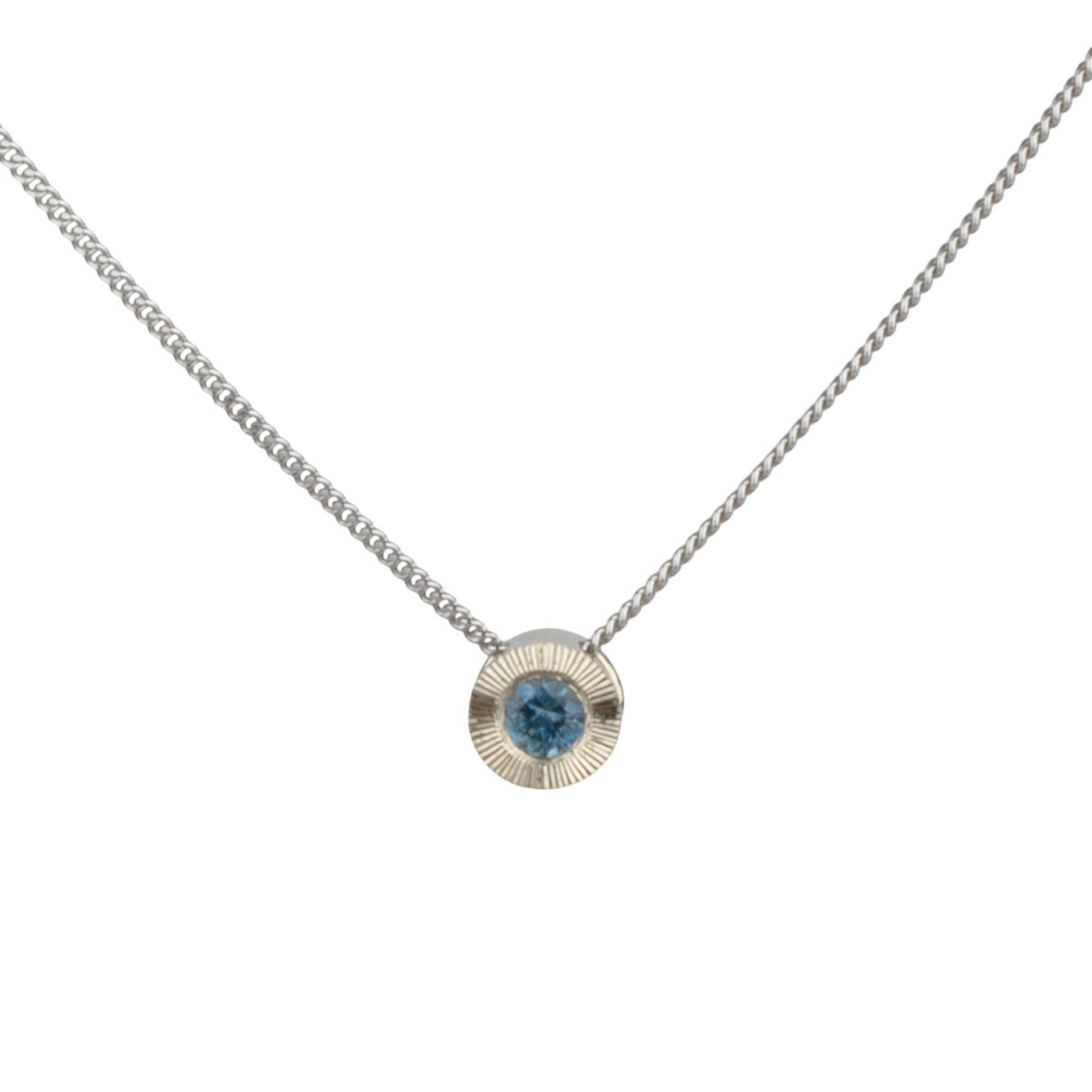 14k white gold small aurora necklace with a blue montana sapphire center 