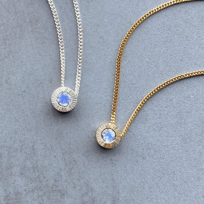 June birthstone Aurora slide necklace with moon in silver and yellow gold
