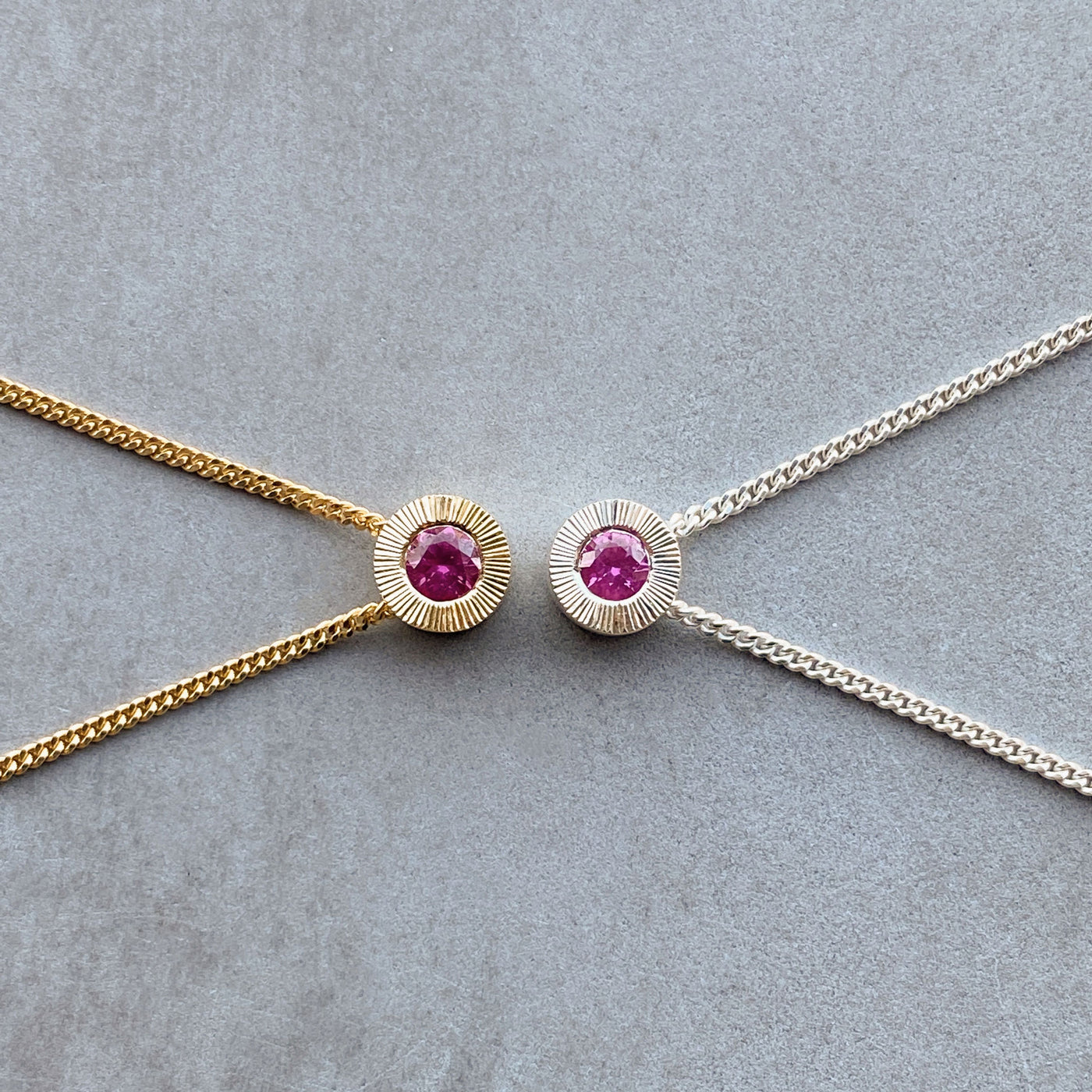 July birthstone Aurora slide necklace with ruby in silver and in yellow gold