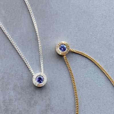 December birthstone Aurora necklace with tanzanite in sterling silver in yellow gold