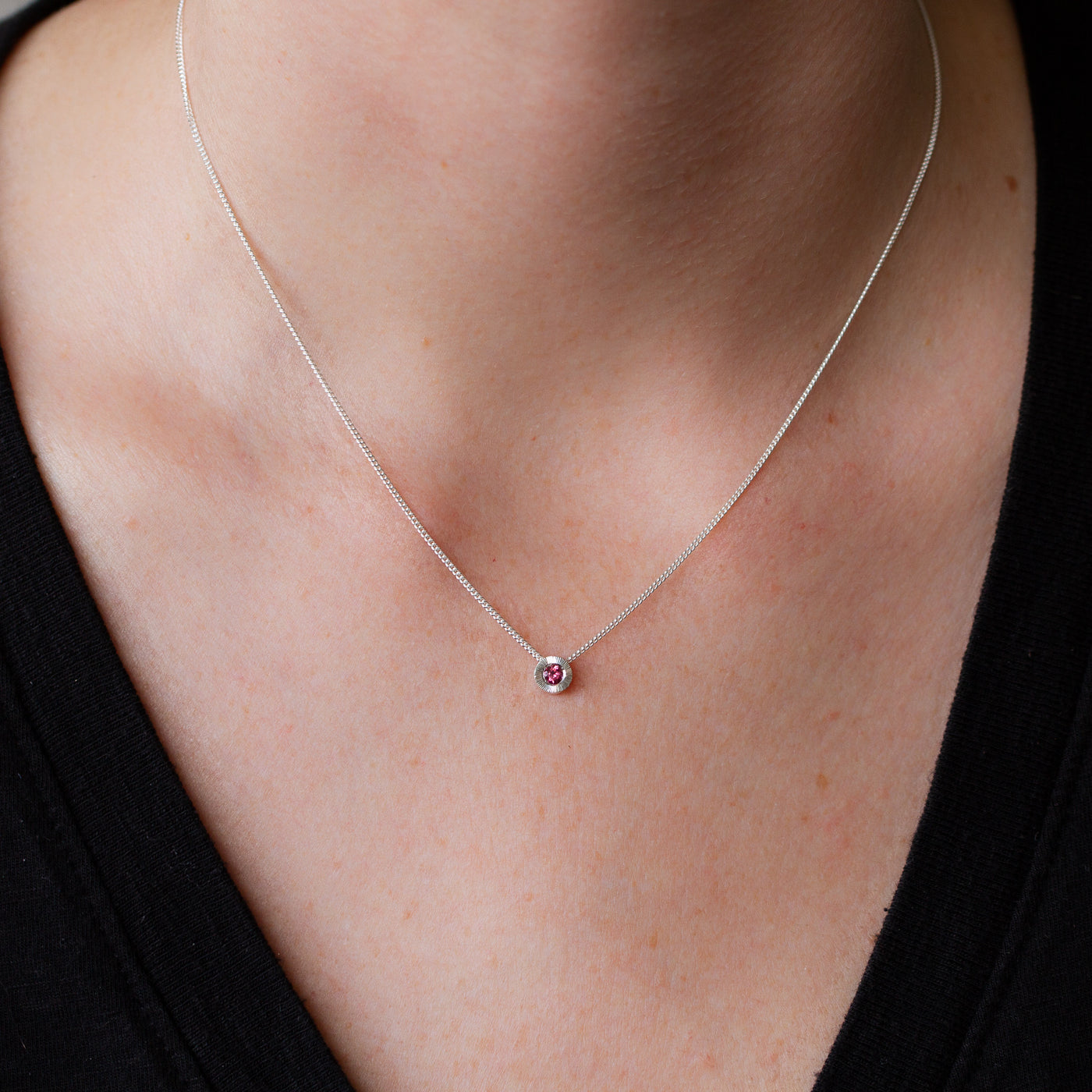 October birthstone Aurora slide necklace with pink tourmaline in silver on a neck