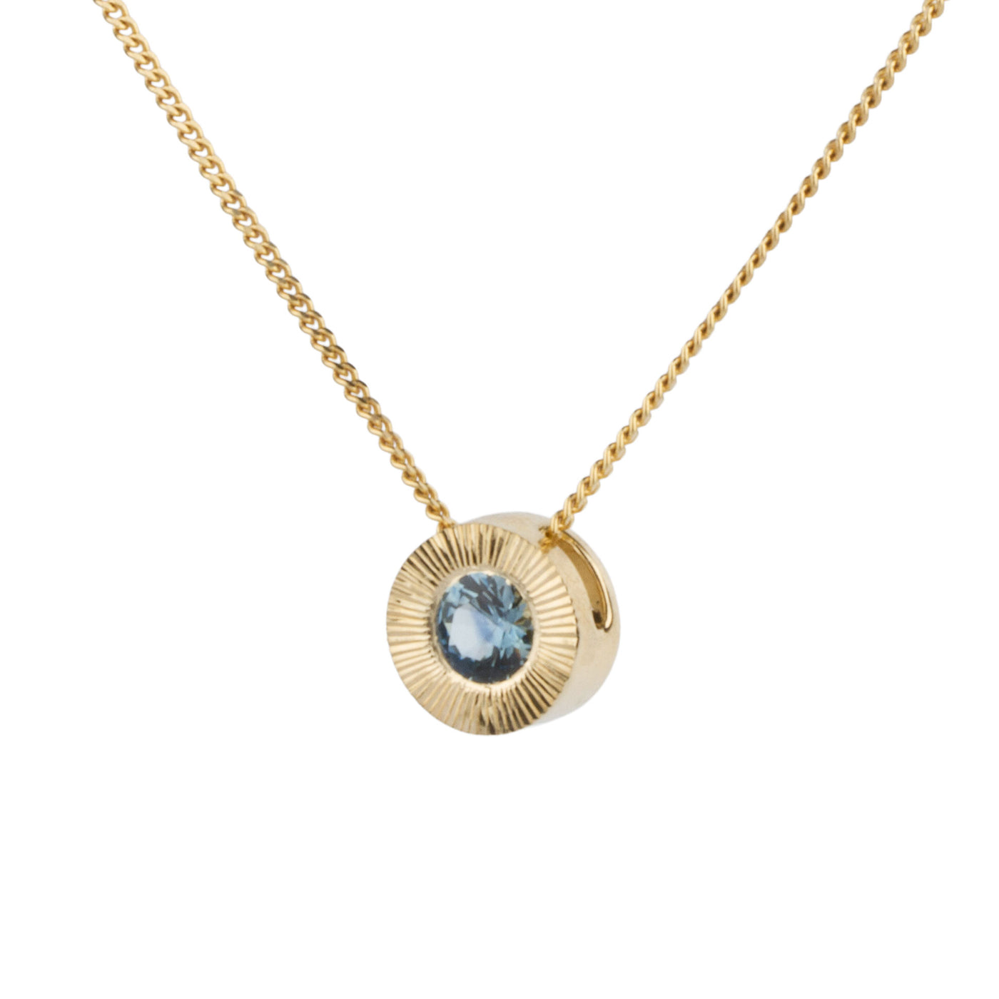 Side view 14k yellow gold large aurora necklace with a denim blue Montana sapphire center and engraved halo border on a white background