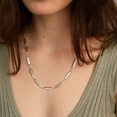 Fragment Link Necklace in Silver modeled on a neck