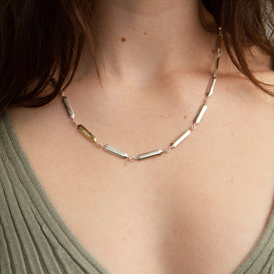 Fragment Link Necklace with Gold Link modeled on a neck