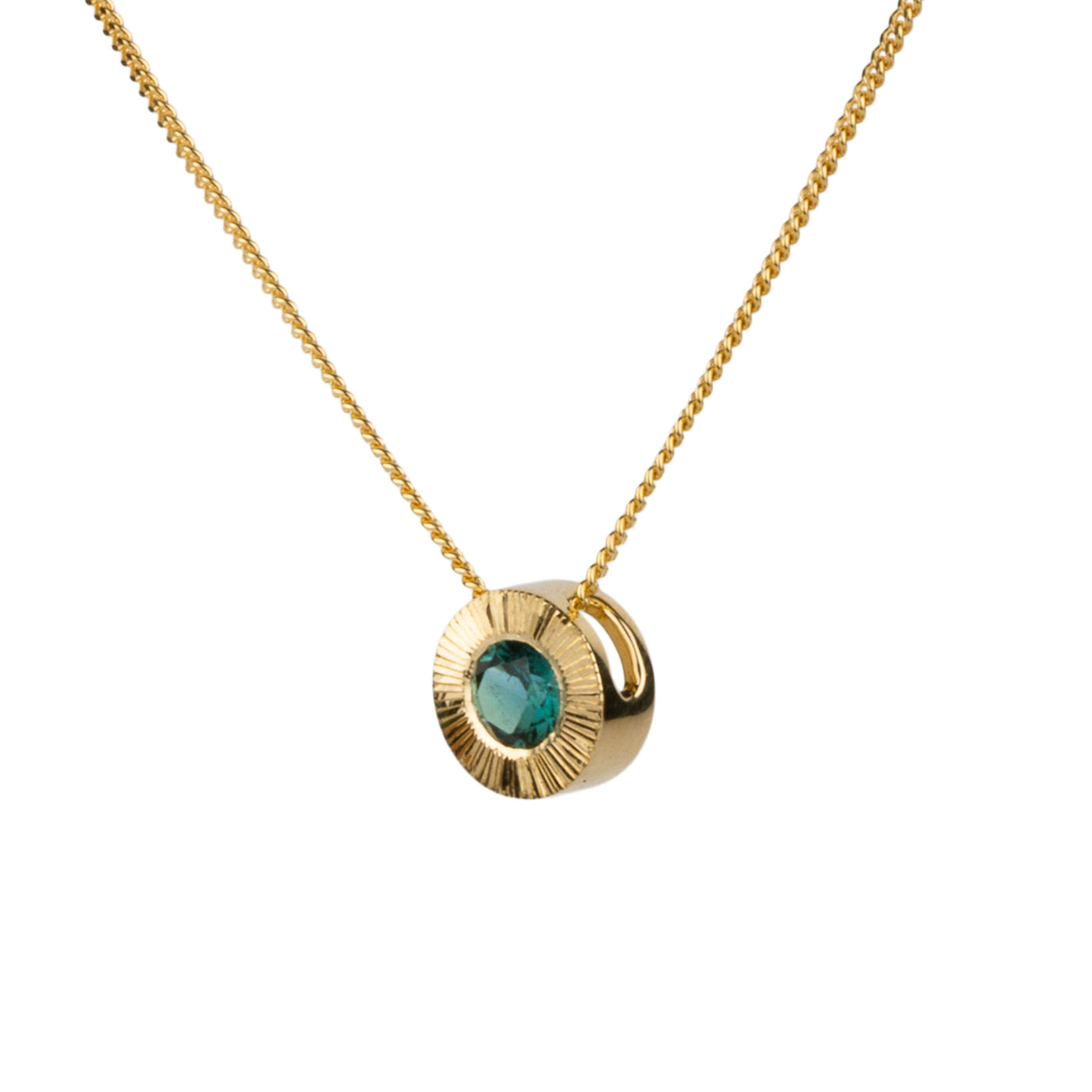 Side view 14k yellow gold medium Aurora necklace with a round teal green indicolite tourmaline center and engraved rays halo border on a white background