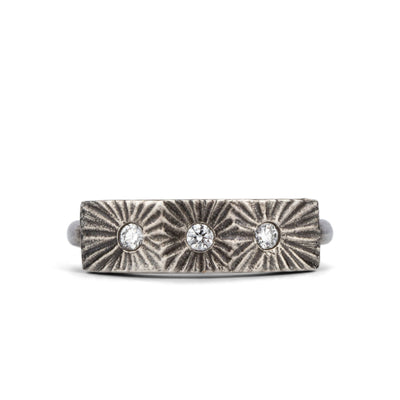 Nova Oxidized Silver and Diamond Ring by Corey Egan on a white background