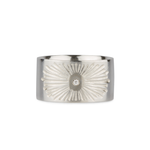 Sterlign silver wide band with single diamond and a carved sunburst design on a white background by Corey Egan